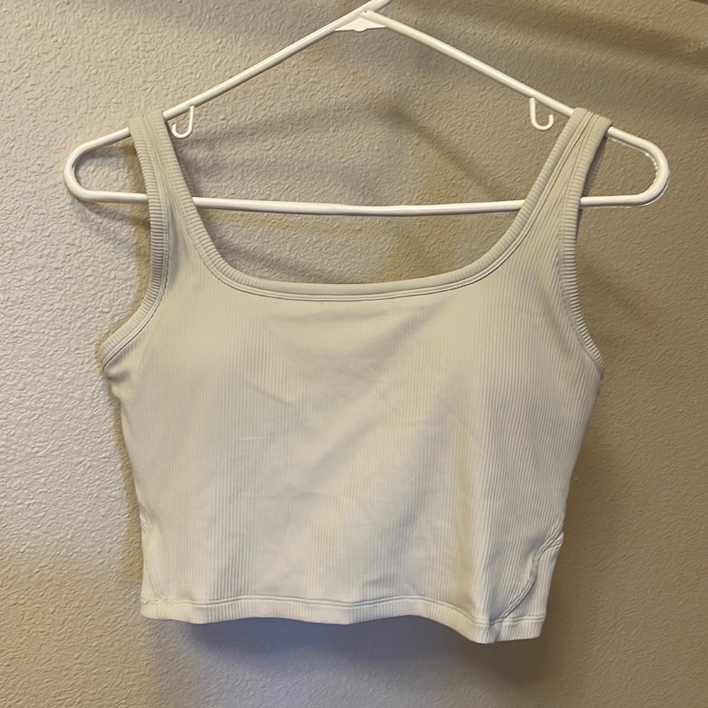 Ivory Cropped workout top. Built in bra